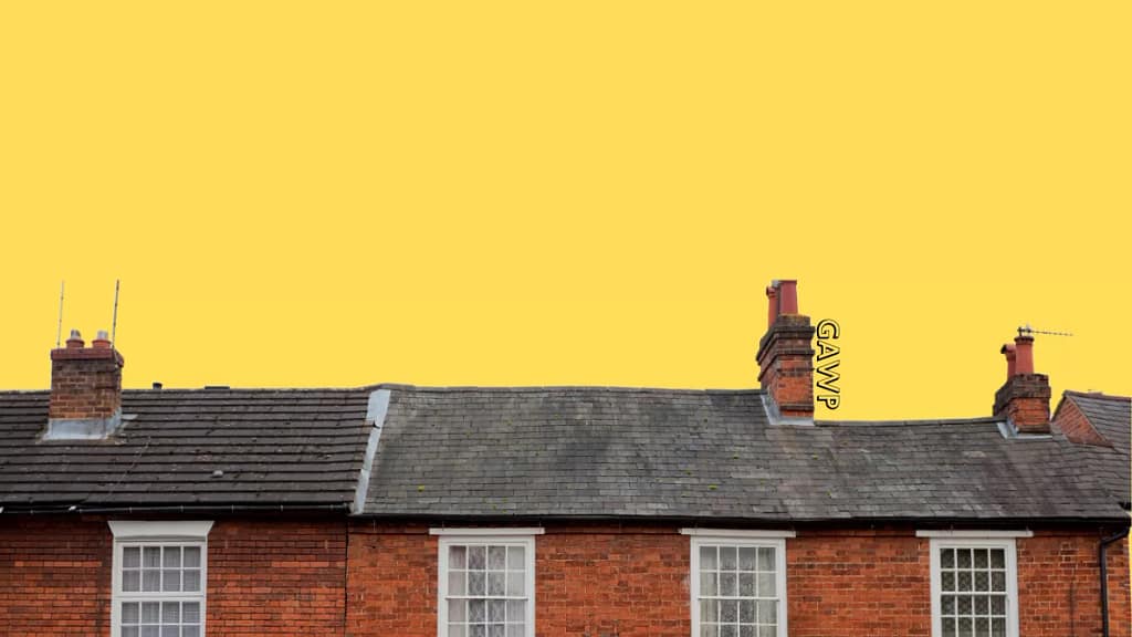A close-up view of a brick building's roof and window, set against a bright yellow background, with the text 'GAWP' visible in the corner.